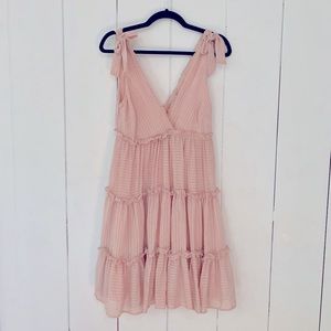 Lulu’s small blush pink ruffle dress
